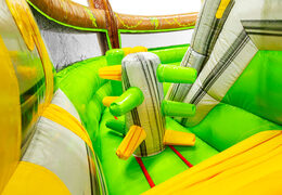 "Dinosaurs World" bouncy castle with an impressive 3D dinosaur above the entrance.