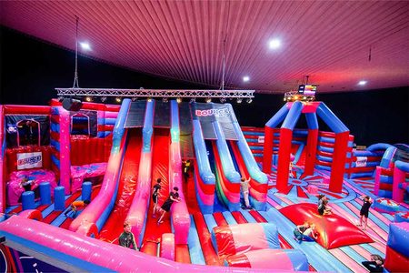 Inflatable Bounce Park Bounce Valley Eindhoven in pink and blue online at JB-Inflatables