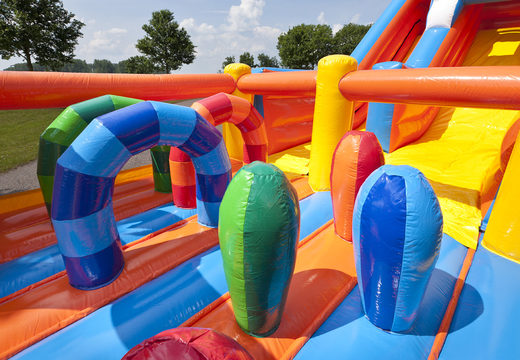 Large inflatable multifunctional slide in a beach theme with a splash pool, impressive 3D object, fresh colors and the 3D obstacles for children. Order inflatable slides now online at JB Inflatables UK