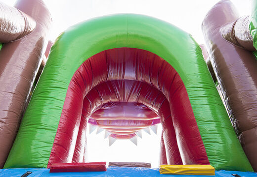 Buy an inflatable crocodile-themed obstacle course with 7 game elements and colorful objects for children. Order inflatable obstacle courses now online at JB Inflatables UK