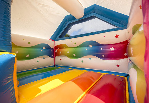 Inflatable slide combo unicorn-themed bouncer for sale at JB Inflatables UK. Buy inflatable bouncers with slide for kids