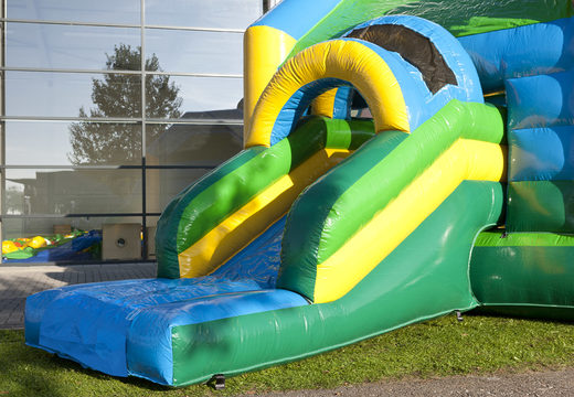 Order inflatable multifun bouncy castle with roof in jungle theme with a 3D object of a gorilla at the top for kids at JB Inflatables UK. Buy inflatable bouncy castles online at JB Inflatables UK