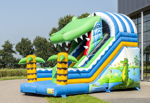 Spectacular inflatable slide in a crocodile theme with cheerful colors for children. Buy inflatable slides now online at JB Inflatables UK