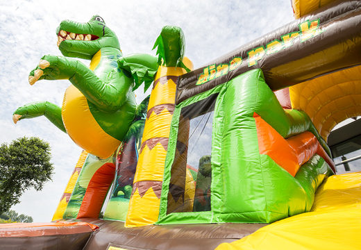 Medium inflatable multiplay bouncy castle in dinoworld theme for children. Order inflatable bouncy castles online at JB Inflatables UK