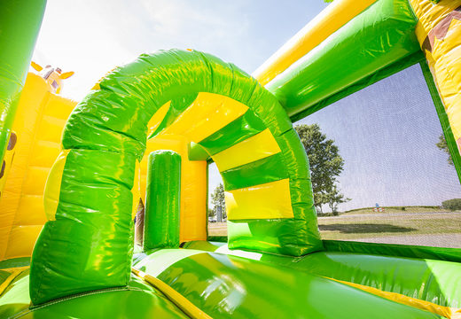 Buy medium inflatable giraffe themed bouncy castle with slide for children. Order inflatable bouncy castles online at JB Inflatables UK