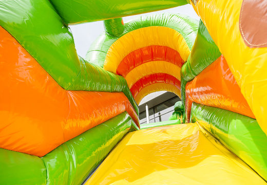 Bounce house in safari gorilla theme with slide, fun objects on the jumping surface and striking 3D objects for children. Buy inflatable bounce houses online at JB Inflatables UK
