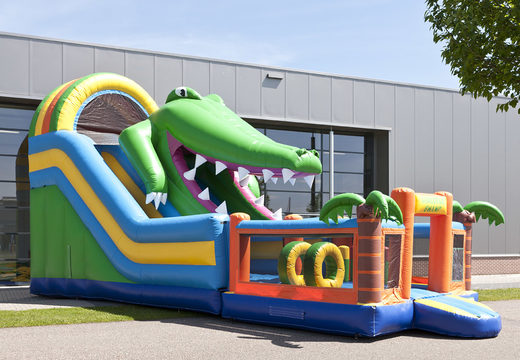 Buy a unique multifunctional crocodile-themed inflatable slide with a splash pool, impressive 3D object, fresh colors and the 3D obstacle for children. Order inflatable slides now online at JB Inflatables UK