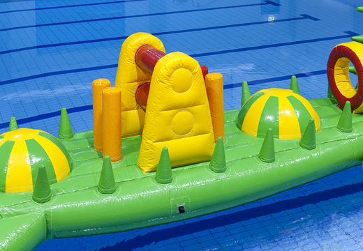 Buy inflatable swimming pool run crocodile 12 meters with challenging obstacle objects for both young and old. Order inflatable obstacle courses online now at JB Inflatables America