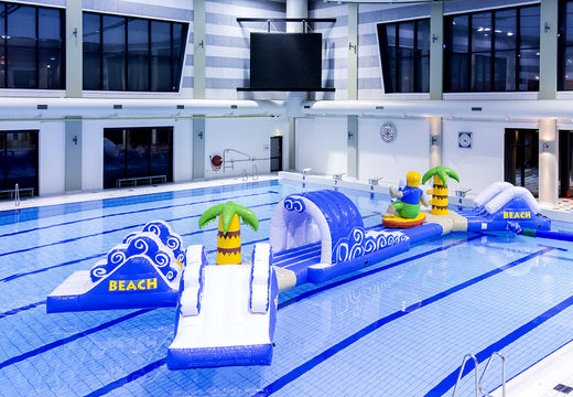 Buy a double inflatable 16 meter long surfer run swimming pool obstacle course in a unique design with funny 3D objects and no less than 2 slides for both young and old. Order inflatable water attractions now online at JB Inflatables America