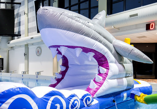 Buy a 13 meter long inflatable shark run obstacle course in a unique design with funny 3D objects and no less than 2 slides for both young and old. Order inflatable pool obstacle courses now online at JB Inflatables America