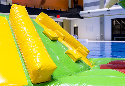 Buy an inflatable airtight crocodile play island with a vine, climbing tower, round slide and obstacles for both young and old. Order inflatable pool games now online at JB Inflatables America