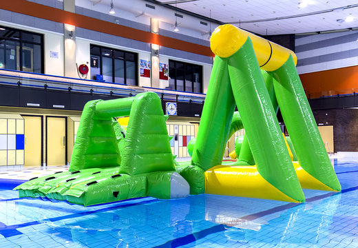 Buy an airtight crocodile play island in a pirate theme with a vine, climbing tower, round slide and obstacles for both young and old. Order inflatable water attractions now online at JB Inflatables America