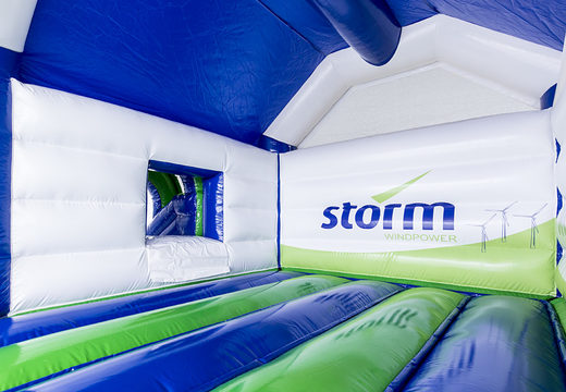 Order inflatable Storm - Multifun Windmill inflatable bouncer with slide custom-made at JB Promotions UK ; specialist in inflatable advertising items such as custom bouncers