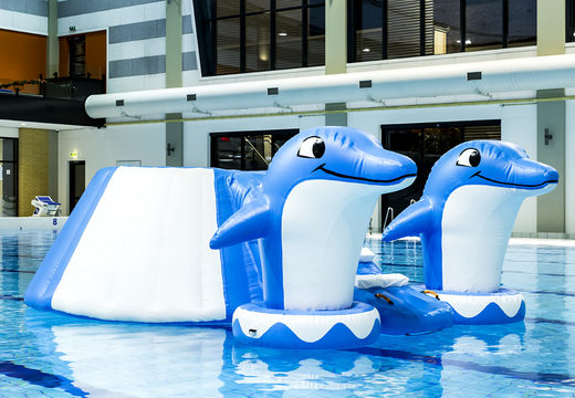 Airtight inflatable island slide in a dolphin theme with the cheerful 3D dolphins and the cool design for both young and old. Buy inflatable pool games now online at JB Inflatables America
