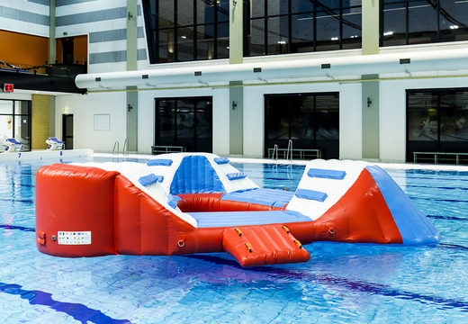 Order inflatable airtight triangle island in the colors red-blue-white for both young and old. Buy inflatable water attractions online now at JB Inflatables America