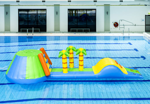 Inflatable vulcano run 9 meters in cheerful colors, a tropical jungle theme, a striking design for both young and old. Order inflatable obstacle courses online now at JB Inflatables America