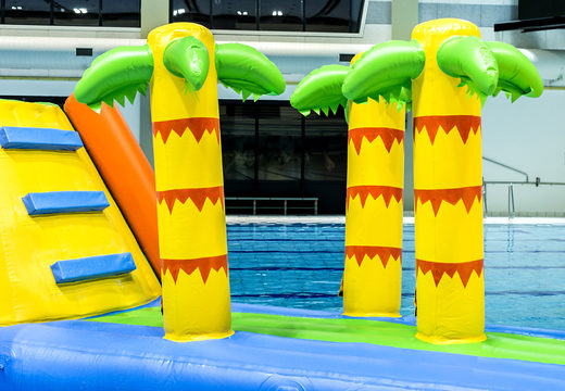 Vulcano run 9 meter obstacle course in cheerful colors, a tropical jungle theme, a striking design for both young and old. Buy inflatable obstacle courses online now at JB Inflatables America