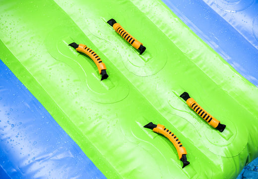 Vulcano run 9 meter assault course in cheerful colors, a tropical jungle theme, a striking design for both young and old. Order inflatable obstacle courses online now at JB Inflatables America