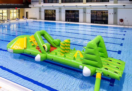 Buy an inflatable crocodile-themed slide for both young and old. Order inflatable water attractions now online at JB Inflatables America