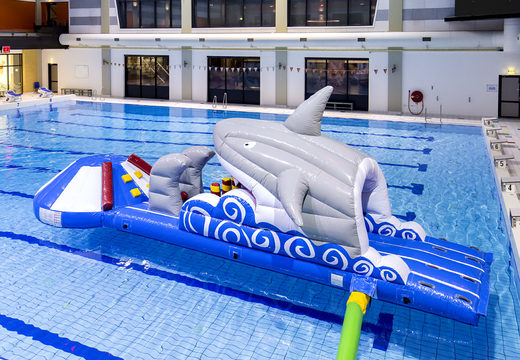 Buy a shark-themed inflatable slide for both young and old. Order inflatable water attractions now online at JB Inflatables America