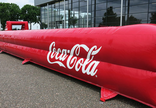 Inflatable inflatable red Coca Cola football boarding for various events. Buy football boardings now online at JB Promotions UK