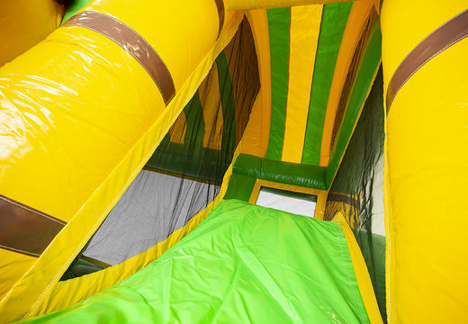 Buy a jungle world theme bouncer with a slide for children. Order inflatable bouncers online at JB Inflatables UK