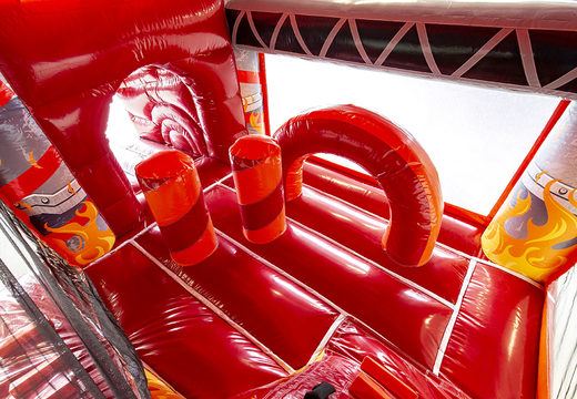 Buy medium inflatable fire brigade themed bouncer with slide for kids. Order inflatable bouncers online at JB Inflatables UK