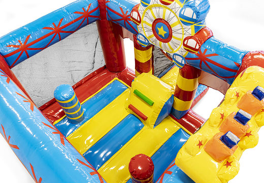 Circus-themed mini inflatable bouncy castle with slide for sale for kids. Order inflatable bouncy castles online at JB Inflatables UK