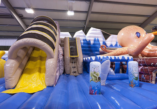 Jungle, animals and seaworld themed bouncy castle with 8 slides, 2 climbing towers, inflatable 3D animals, fun obstacles and obstacle courses for kids. Buy bouncy castles online at JB Inflatables  UK