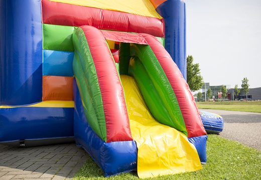 Midi multifun inflatable bounce house for kids for sale in a colour combiantion of red blue green yellow and orange in standard theme. Online available at JB Inflatables UK 