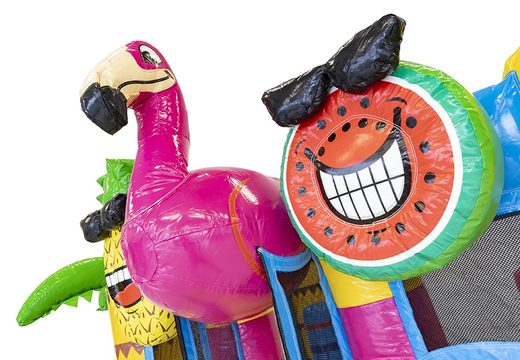 Oder mini multiplay inflatable bouncer in flamingo theme with slide for children. Inflatable bouncers with slide to buy online at JB Inflatables UK