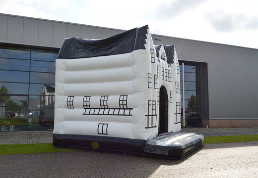 Have a bespoke Castle Staverden bouncy castle made in your own corporate identity  at JB Promotions UK. Order online custom made promotional inflatables in all shapes and sizes