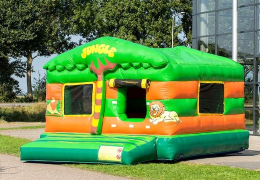 Large covered ball pit bouncy castle in jungle theme for children. Order bouncy castles online at JB Inflatables UK