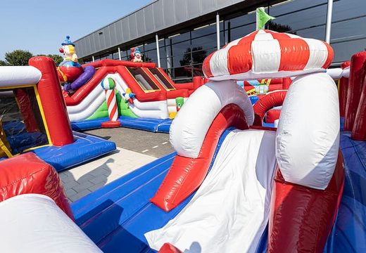 Order an inflatable circus bouncer with slides and fun obstacles with prints for children. Buy bouncers online at JB Inflatables UK