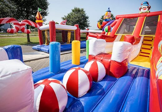 Order a circus themed inflatable bouncer with multiple slides and all kinds of fun obstacles with prints for kids. Buy bouncers online at JB Inflatables UK