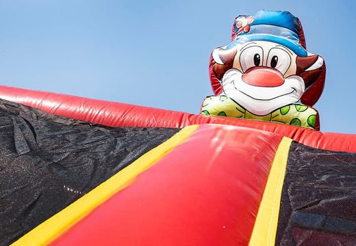 Circus bouncer with slides, obstacles with fun circus-themed prints for kids. Buy bouncers online at JB Inflatables UK
