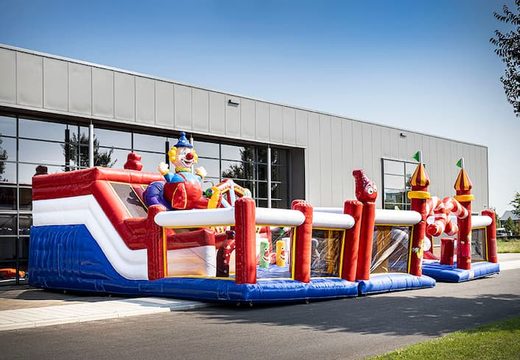 Buy an inflatable circus bouncy castle with multiple slides and all kinds of fun obstacles with circus prints for kids. Order bouncy castles online at JB Inflatables UK