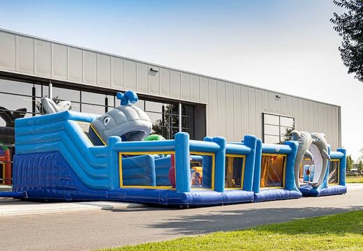Seaworld themed inflatable bouncy castle with multiple slides and all sorts of fun obstacles with themed prints for kids. Order bouncy castles online at JB Inflatables UK