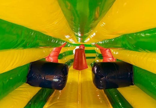 Gorilla-themed inflatable crawl tunnel with obstacles, use a climbing ramp and slide for children. Buy bouncers online at JB Inflatables UK