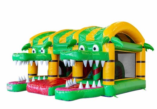 Buy large indoor inflatable xxl bouncy castle with slide in a crocodile theme for children. Order bouncy castles online at JB Inflatables UK