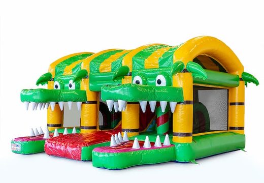 Indoor multiplay crocodile bouncy castle in  unique designs, with a slide and 3D objects for children. Order bouncy castles online at JB Inflatables UK