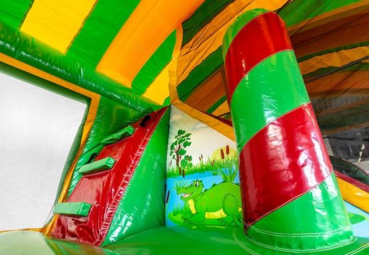 Order large inflatable indoor crocodile multiplay bouncer with slide in Lego theme for kids. Buy bouncers online at JB Inflatables UK