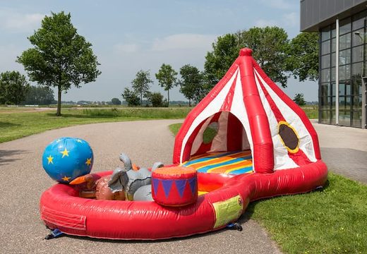 Buy a semi-open playzone Circus bouncy castle with plastic balls and 3D objects for children. Order bouncy castles online at JB Inflatables UK