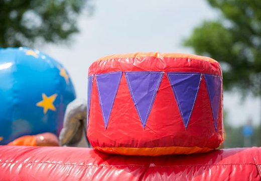 Buy a bouncer in the playzone circus theme with plastic balls and 3D objects for kids. Order bouncers online at JB Inflatables UK