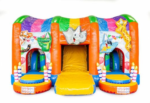 Inflatable multiplay Party bouncy castle with a slide in the middle and 3D objects for children. Order bouncy castles online at JB Inflatables UK