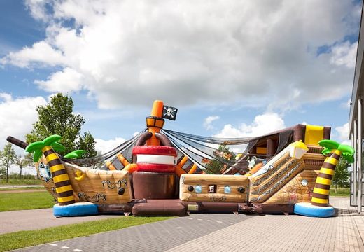 Order Mega Pirates Shooter inflatable  bouncy castle in ship shape with shoot and slide game for kids. Buy inflatable bouncy castles online at JB Inflatables UK