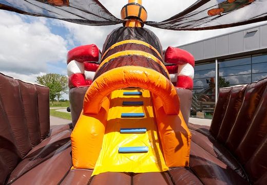 Order Mega Pirate Shooter bouncy castle in ship shape with shooting game and slide for kids. Buy inflatable bouncy castles online at JB Inflatables UK