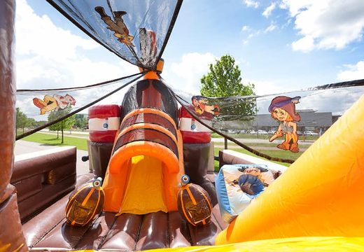 Order Mega Pirate Shooter bouncer in ship shape with shooting game and slide for kids. Buy inflatable bouncers online at JB Inflatables UK