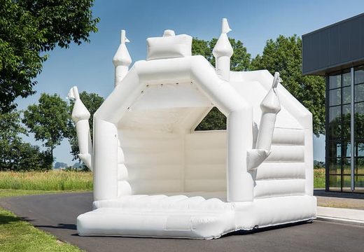 Standard white bouncy castle entirely in a wedding theme in the shape of a castle for children for sale. Order bouncy castles online at JB Inflatables UK