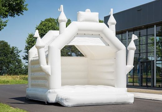 Buy standard indoor bouncy castles with a wedding theme in the form of a castle for children. Buy inflatables online at JB Inflatables UK